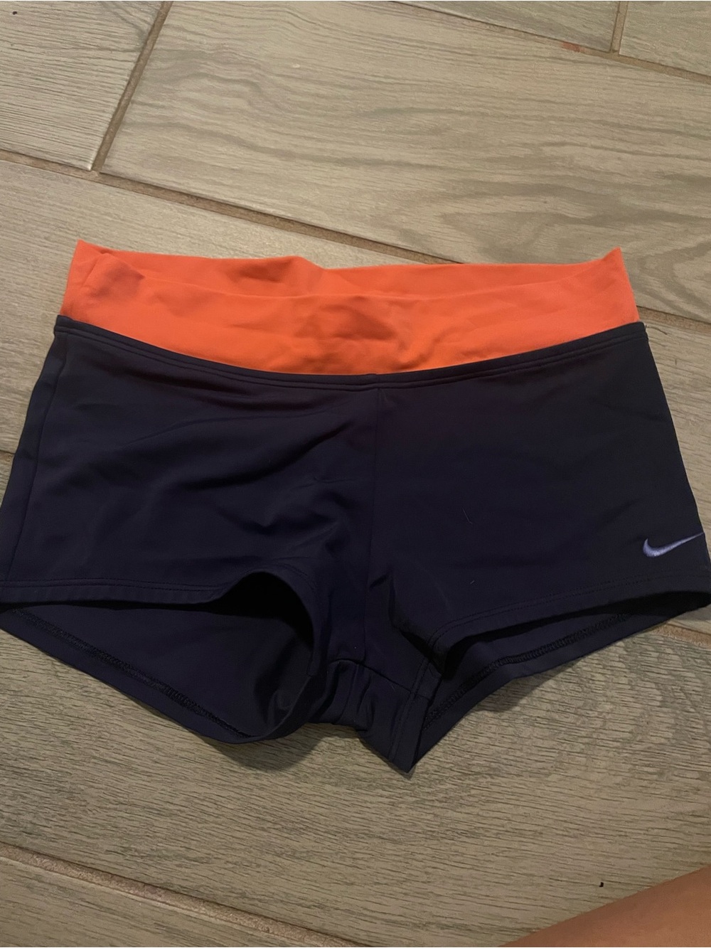 Nike Women’s Navy Athletic Shorts with Orange Waistband